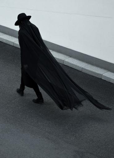 Dark Figure in Motion - Related Dark Wallpapers wallpaper