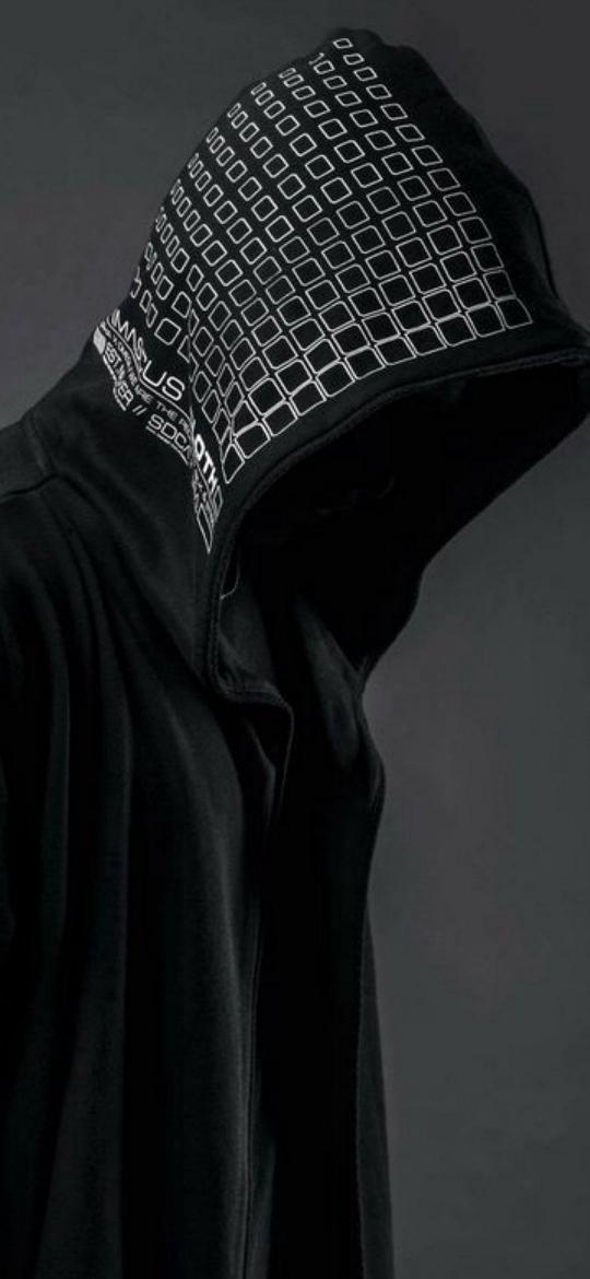 Hooded Figure in Shadow