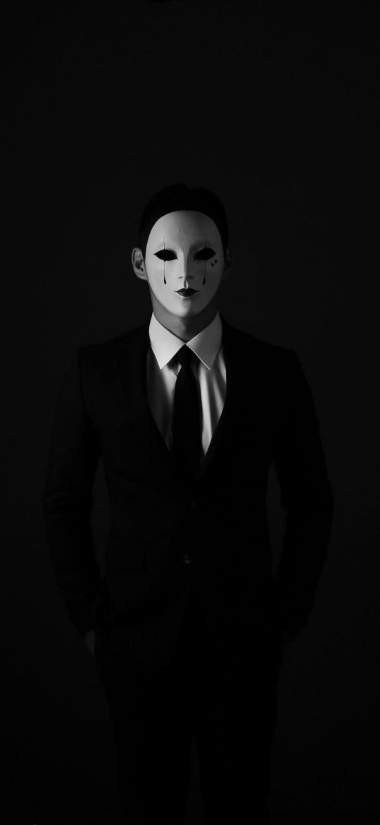 Masked Figure in Darkness