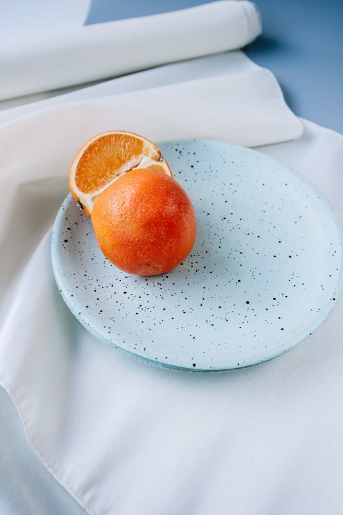 Orange on Speckled Plate