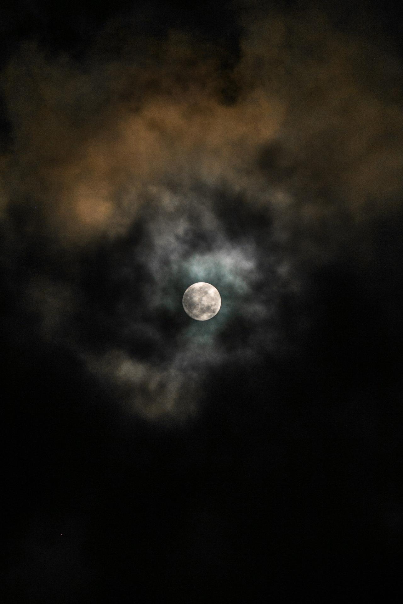 Moon Through Dark Clouds