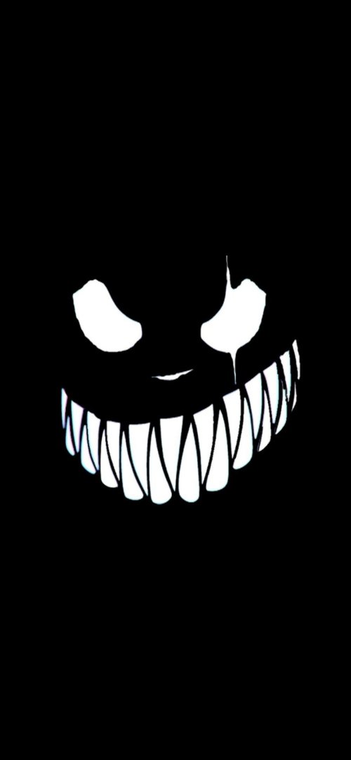 Sinister Grin Wallpaper