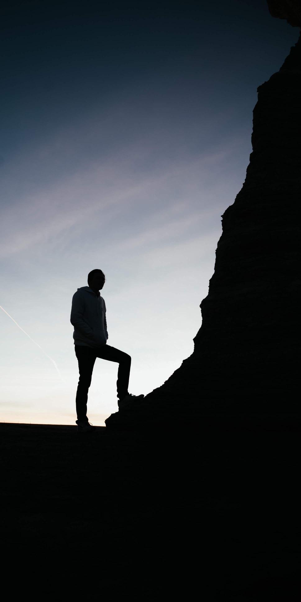 Silhouette on Rocky Peak - Related Ghetto Wallpapers wallpaper
