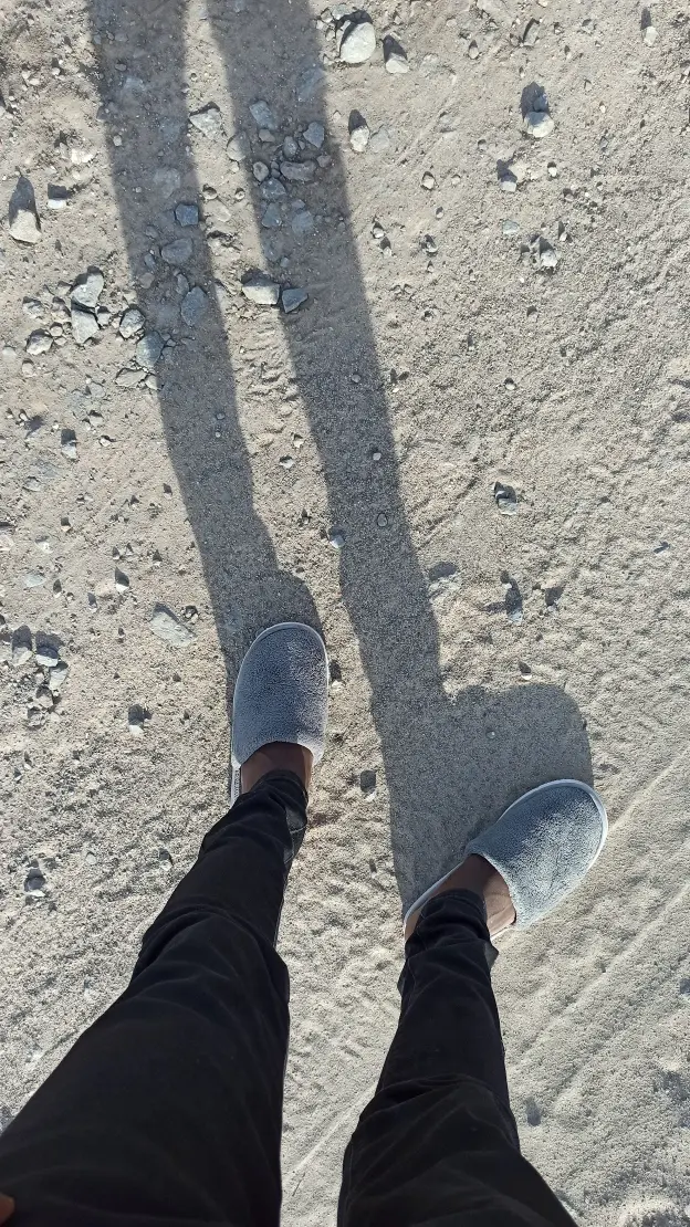 Slippers on Sandy Ground