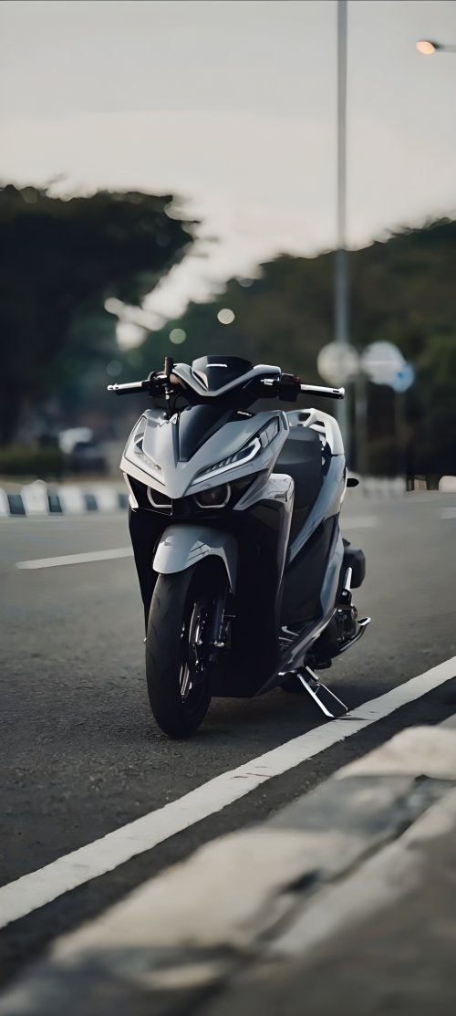 Sleek Scooter on Asphalt - Related Ghetto Wallpapers wallpaper